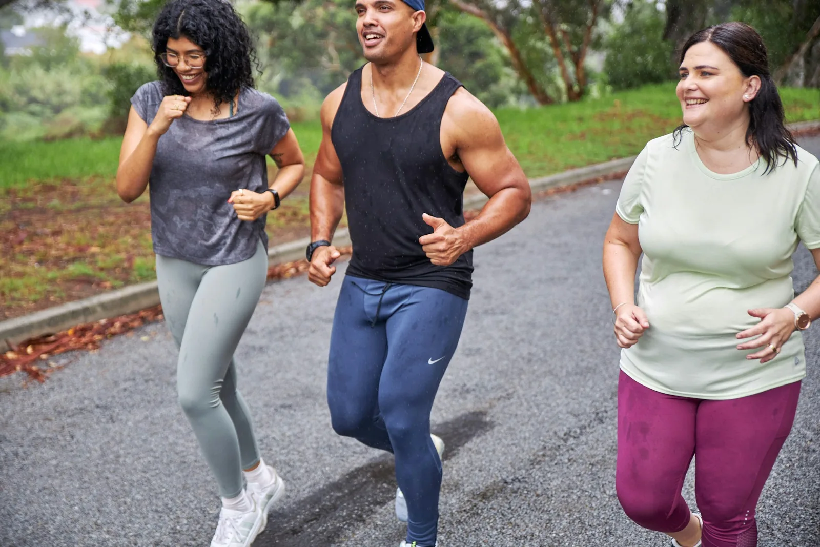 Friends running together outdoors